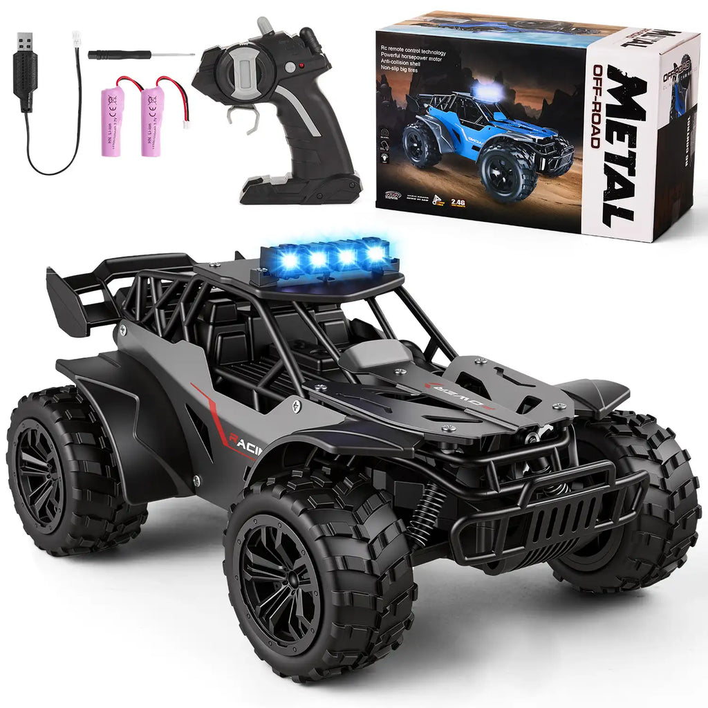 Carro de controle remoto preto e cinza com controle, baterias, cabo USB, chave e caixa sobre fundo branco.