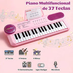 Teclado infantil rosa visto de cima com 37 teclas, botões de controle, alto-falante e microfone.
